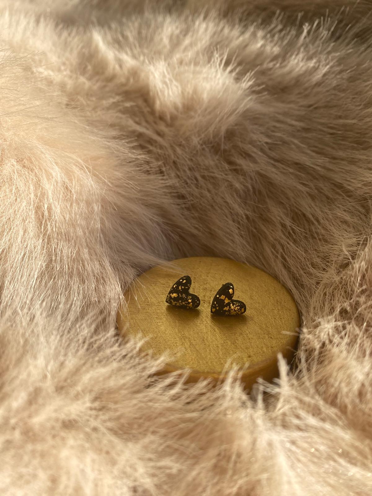 Black and gold heart stud earrings